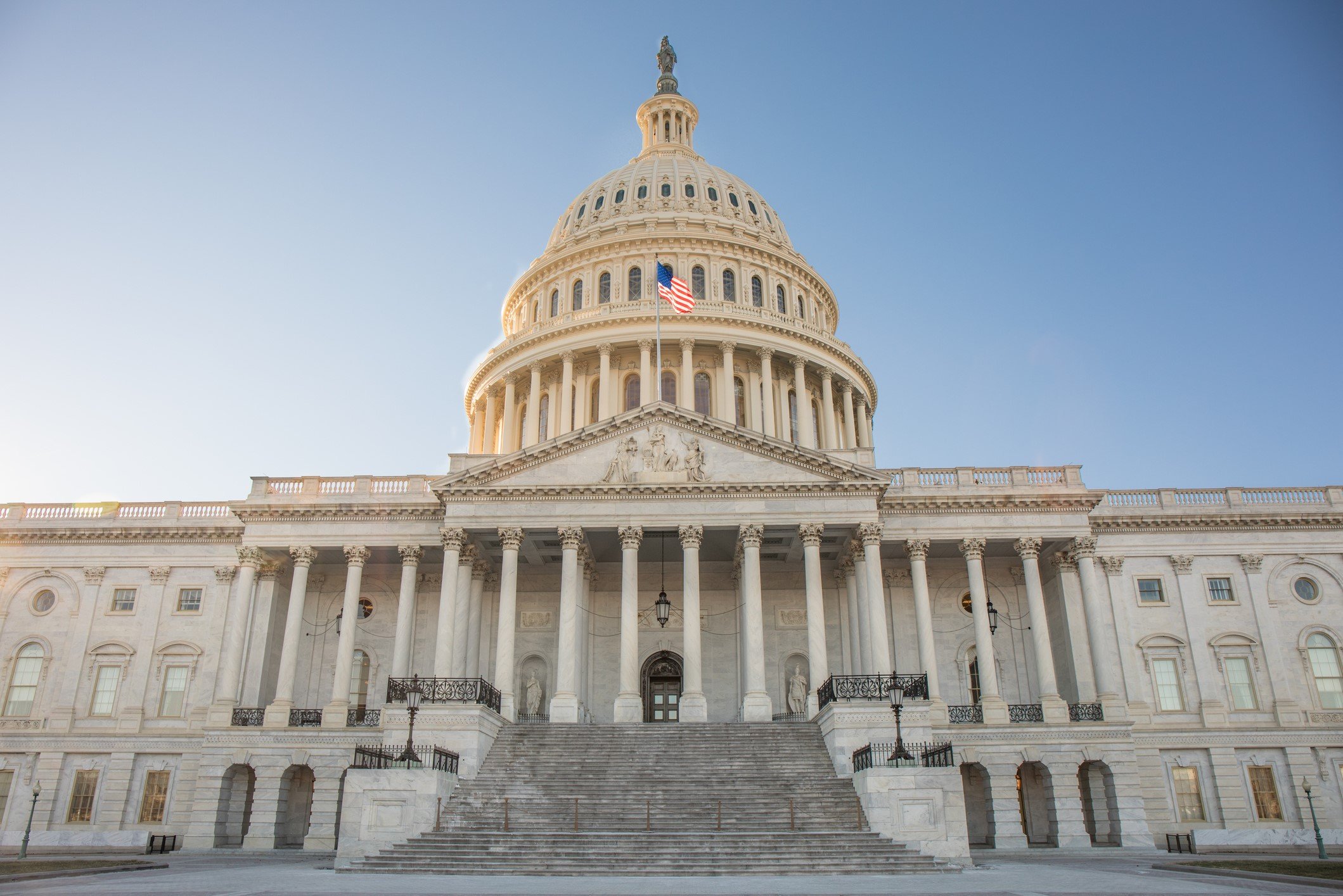 The Capitol Building in Washington DC with bright blue sky - stock photo Becky WrightGetty Images